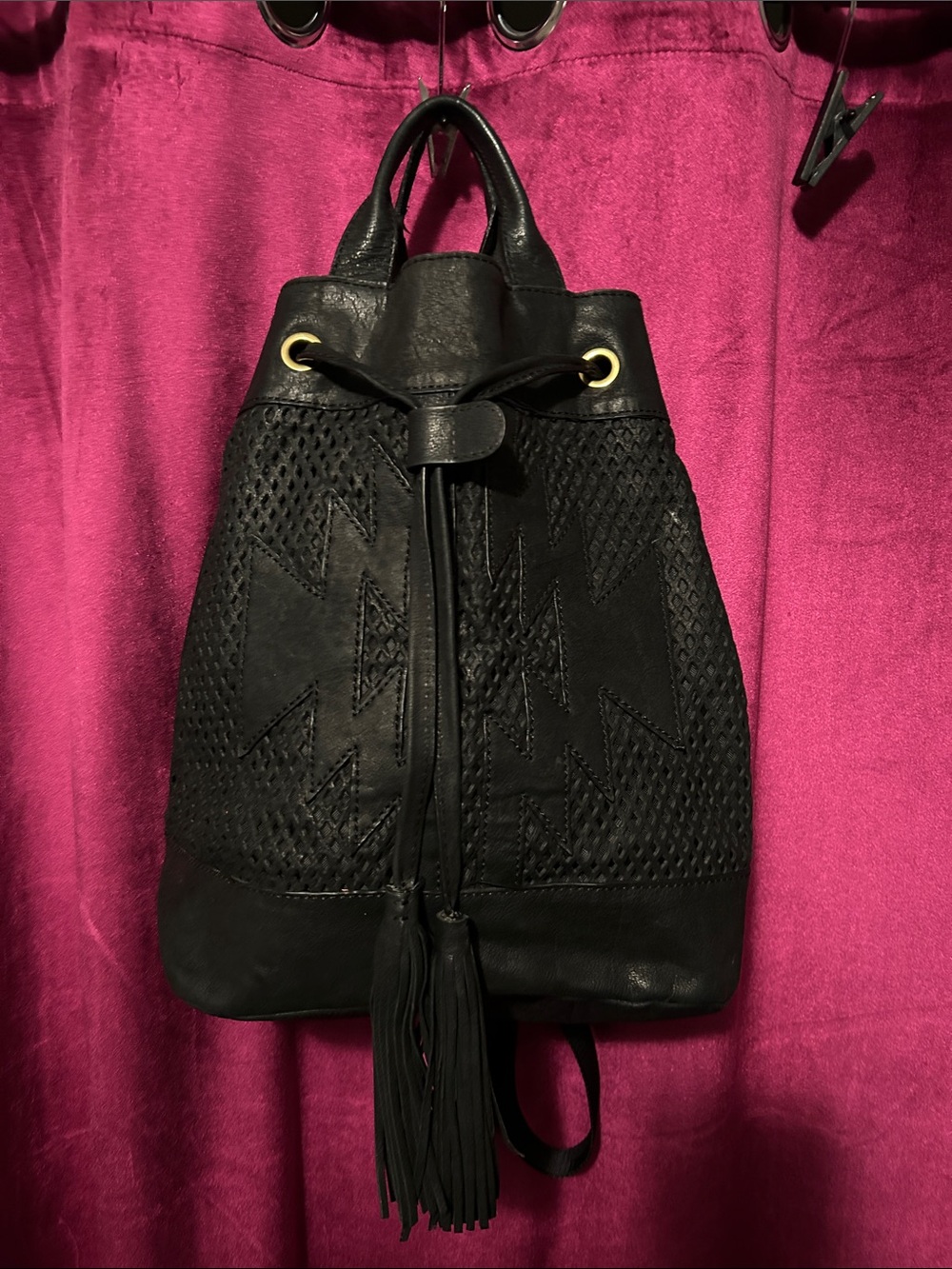 Cynthia Vincent Black Woven Leather Drawstring Backpack with Tassel